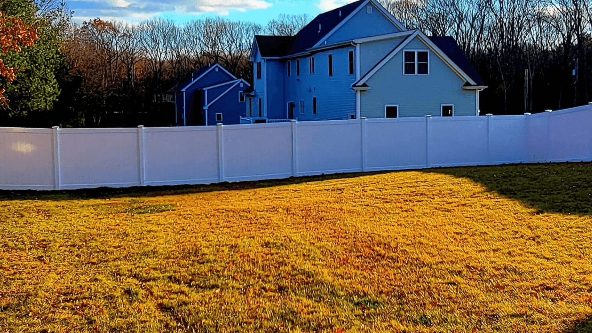 Slopped terrain fence installation project - North Smithfield Fence